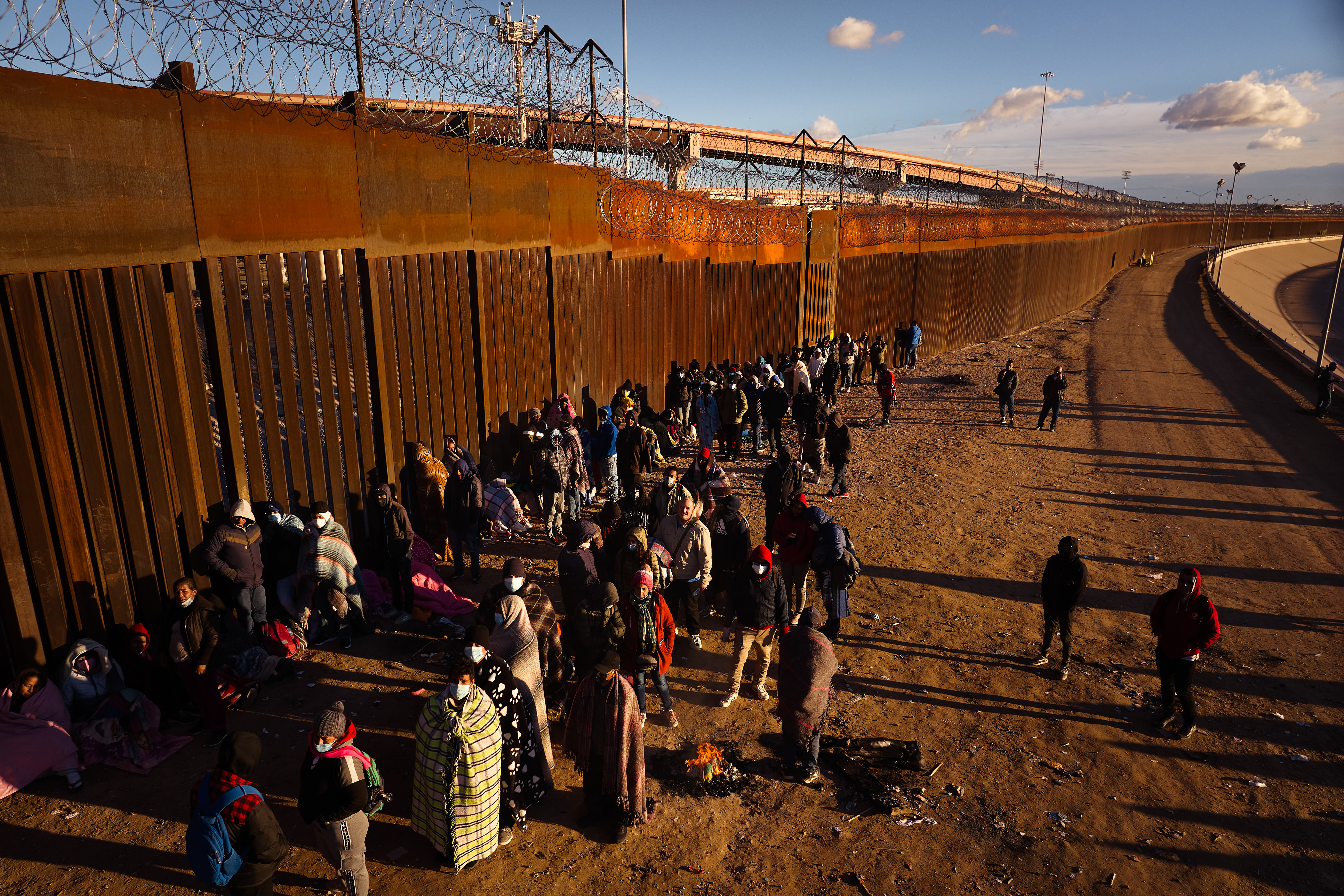 Migrants wait to cross U.S.-Mexico border